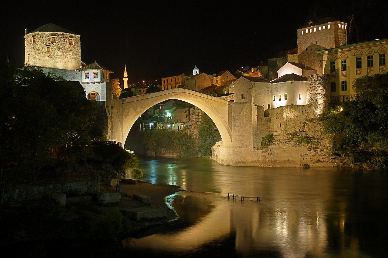 The rebuilt Stari Most (Old Bridge) over the Neretva river in Mostar, illuminated at night